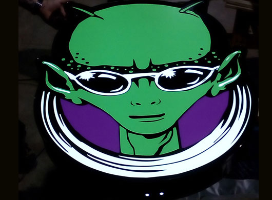 Photo of Alien custom logo sign