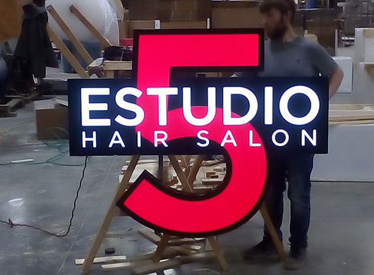 Photo of E Studio custom logo sign