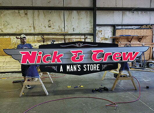 Photo of Nick & Crew non-illuminated cabinet sign
